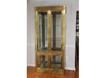 A Gold Lighted Display Cabinet