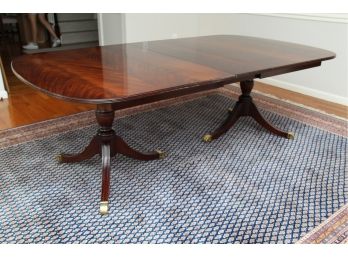 A Dual Pedestal Flame Mahogany Dining Table