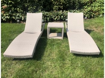 A Pair Of All Weather Outdoor Weaved Lounge Chairs  With Side Table