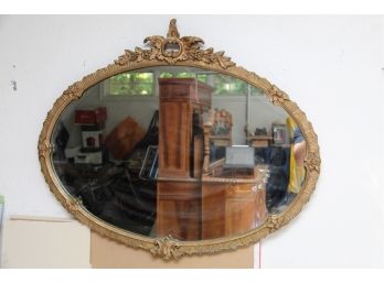 An Antique Gold Frame Oval Wall Mirror