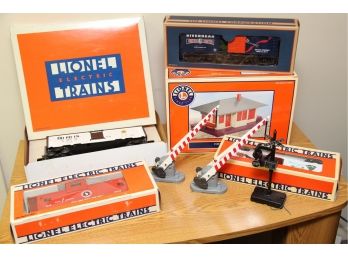 Set Of 4 Lionel Trains With Additional Passenger Station & Rail Crossing Signs