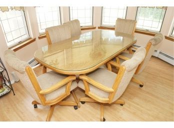 Light Oak  Dining Room Table With 6 Coordinating Rolling Chairs