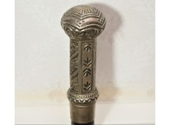 A Metal Etched Ball Top Walking Cane In Black