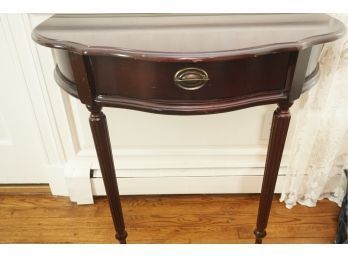 A Dark Cherry Floating Console Table By The Bombay Company