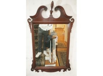 A Scroll Mirror With Finial