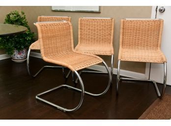 A Set Of Four Miles Van Der Rohe Chrome And Rattan Chairs