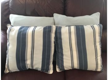 Four Blue Throw Pillows