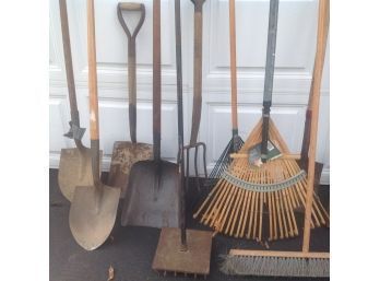Assorted Garden Tools Including Rakes & Shovels