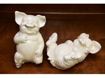 Two Pig Figurines By Castique Inc.