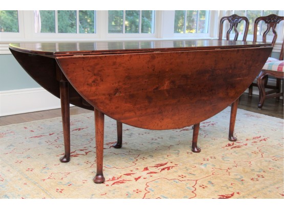 A Georgian Mahogany Drop Leaf Dining Table By Yorkshire House Inc.