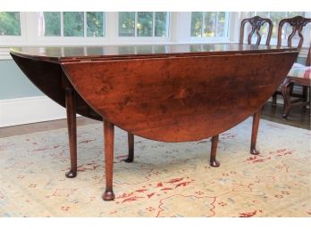 A Georgian Mahogany Drop Leaf Dining Table By Yorkshire House Inc.