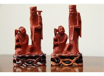 Pair Of Red Cinnabar Asian Figurines On Stands