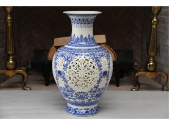 A Chinese Stamped Blue And White Pierced Porcelain Vase