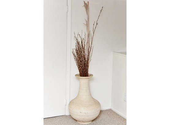 A Large Floor Standing Clay Composite Vase