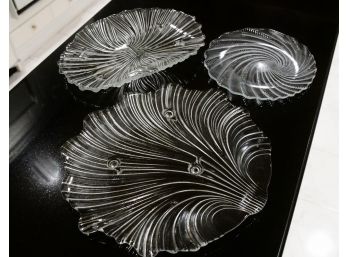 A Trio Of Swirl Glass Serving Platters