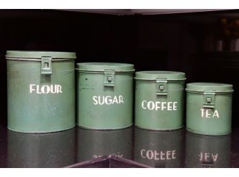 A Set Of Vintage Green Canisters