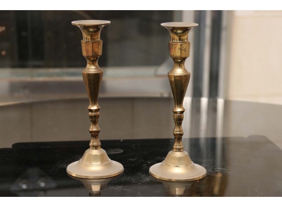 A Pair Of Vintage Brass Candle Sticks