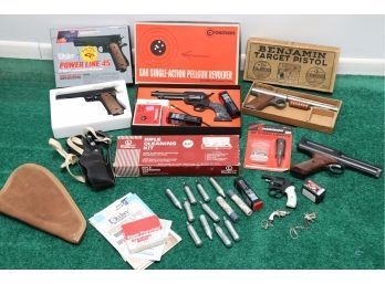 A Large Collection Of BB  Pellet Guns With Accessories