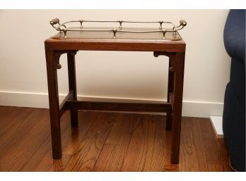 A Vintage Butler Table With Brass Rail Top