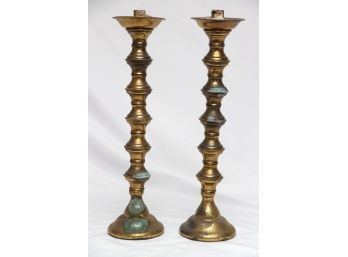 A Pair Of Old Tall Brass Candlesticks