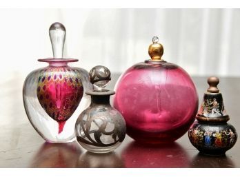 A Collection Of Art Glass Perfume Atomizers