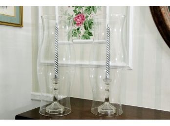 A Pair Of Large Hurricanes With Glass Candlesticks And Candles