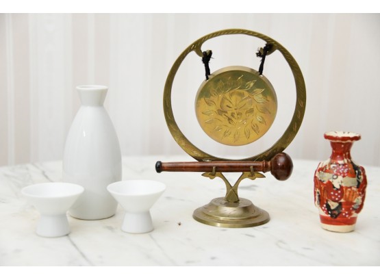 Assortment Of Items Gong Saki And Urn