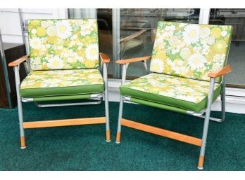 A Pair Of Mid Century Folding Lounge Chairs
