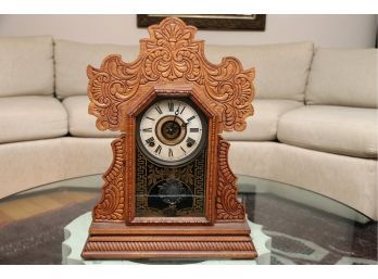 E. Ingraham & Co. Carved Walnut Mantle Clock