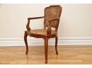 Louis XV Walnut Cane Armed Chair