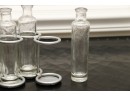 5 Small Vases In Holder
