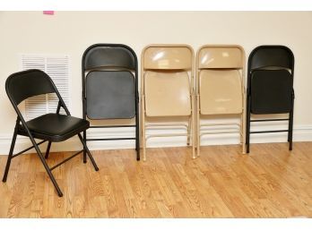 Five Metal Folding Chairs