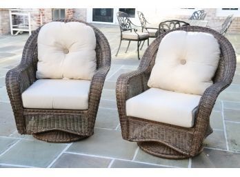 Pair Of Outdoor Wicker Swivel Arm Chairs With Sunbrella Cushions