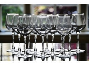 A Set Of Twelve Modern Elegantly Shaped Wine Glasses