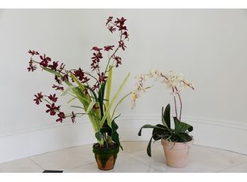 A Pair Of Faux Orchids