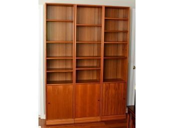 Trio Of Bookshelves With Lower Storage
