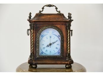 A Decorative Wooden Mantle Clock