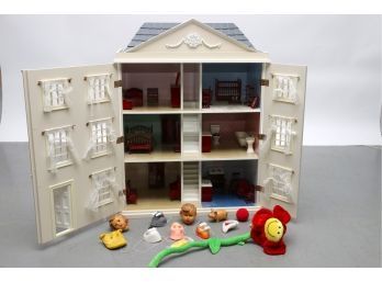 A Furnished Doll House With Accessories