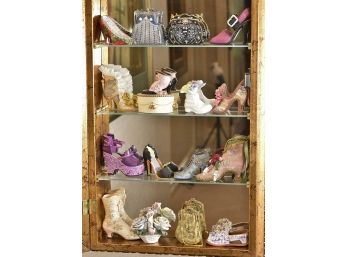 Mirrored Back Wall Cabinet With Shoes And Bags