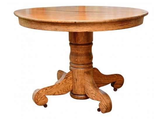 Golden Tiger Oak Round Pedestal Dining Table