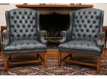 Pair Of Blue Button Tufted Leather Wingback Chairs With Gunmetal Patina Finish