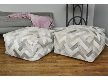 Pair Of Cowhide Ottomans