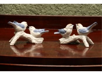 Porcelain Birds Resting On Branches