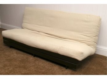 Black Wood Frame Futon With Cream Colored Cushion