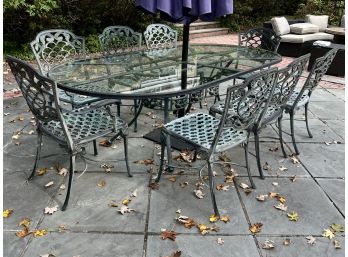 Cast Aluminum Oval Table With Chairs And Umbrella