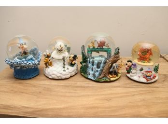 Collection Of Snow Globes Including Disney, Lion King And Charlie Brown