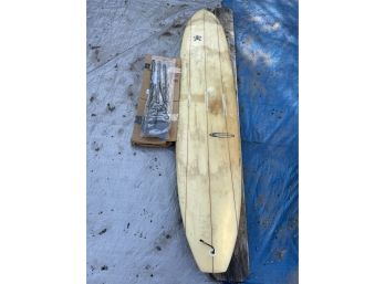 Vintage Surfboard And Brand New Oars