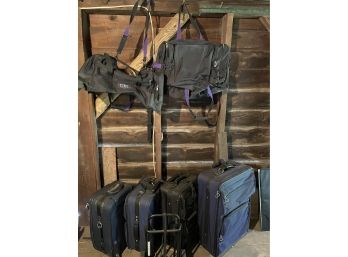 Lot Of Suitcases And Luggage Cart