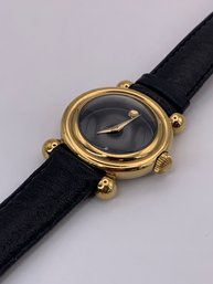 Swiss MOVADO Anniversary Wristwatch, Water Resistant, Black Face & Band, Gold Toned Bezel, Need Battery