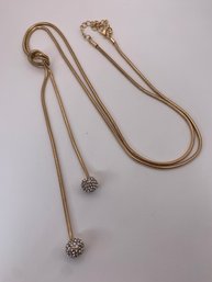 Slinky Gold Toned Knot Necklace With Crystal Encrusted Balls, Knot Can Be Adjusted, Hanging Length 24 Inches